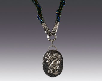 Dragon Heart - handmade from sterling silver sheet and czech glass beads