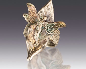 The Queen of the Woodlands - sterling silver fairy on a leaf ring.