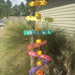 Creative Destinations directional arrow signs. Personalized custom hand made signs.
