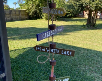 Creative Destinations directional arrow signs. Personalized custom hand made signs.