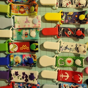 20 For 22.00 Tubie Clips, extension covers, gtube pads, mix & match. You pick your prints, all the same or mixture.  Big selection.
