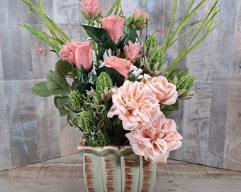 Pink rose and carnation table arrangement, centerpiece in green ceramic vase, spring and summer floral arrangement