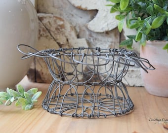 Old Wire Egg basket, egg basket, antique wire basket.