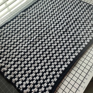 Navy and white crochet baby blanket