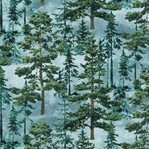 May include: Fabric with a repeating pattern of evergreen trees in varying shades of green and brown against a light blue background. A ruler is at the bottom, showing measurements in inches.