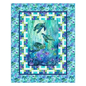 May include: A rectangular quilt featuring a central panel of three sea turtles swimming in a vibrant underwater scene with coral and fish. The quilt is framed by a geometric border of white, teal, and blue squares, surrounded by a patterned edge.