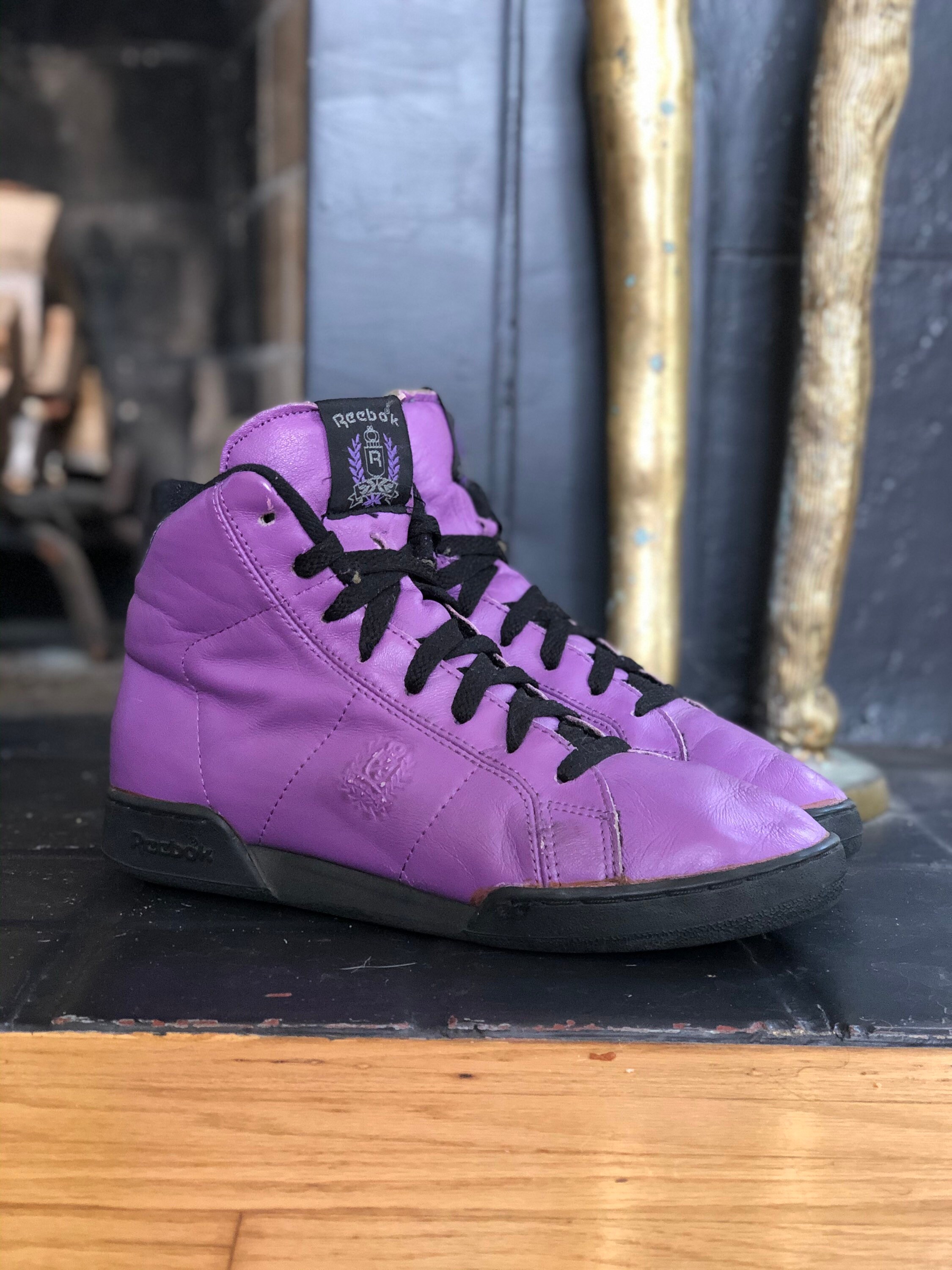 purple reebok high tops