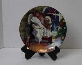 Plato decorativo navideño vintage "Sueños Celestiales" de 1997. De Avon, diseñado por Michael Garland.