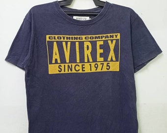 Camiseta vintage AVIREX, cuello redondo, estilo militar, estilo militar, con logotipo gráfico, talla mediana