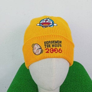 Gorro vintage de la película Doraemon, amarillo, bordado con dibujos animados japoneses, para hombre y mujer, talla única.