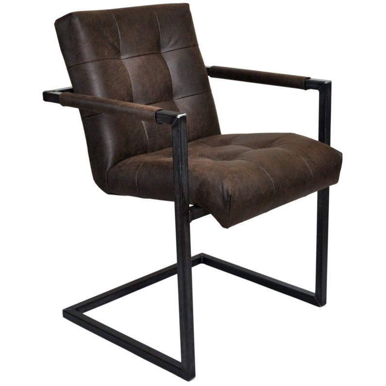 May include: A brown leather dining chair with a metal frame. The chair has a tufted back and seat and a square base.