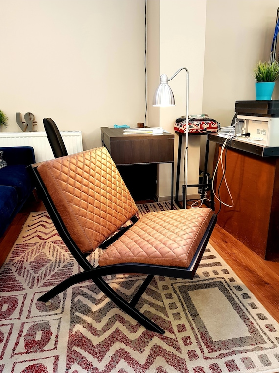 Brown leather sale chair metal frame
