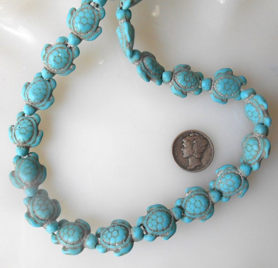 Circle Turquoise Stone with Carved Sides Circle Turquoise Stone with Carved Sides