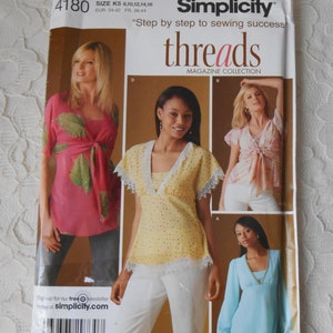 May include: Simplicity Threads magazine pattern for sewing tops. The pattern includes three different styles: a pink top with a tie, a yellow top with lace trim, and a light blue top with long sleeves. The pattern is for sizes K5 8, 10, 12, 14, 16, EUR 34-42, FR 36-44.