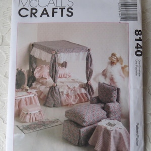 May include: A McCall's Crafts sewing pattern for a doll's bedroom set. The pattern includes a canopy bed, armchair, ottoman, and table. The pattern number is 8140.