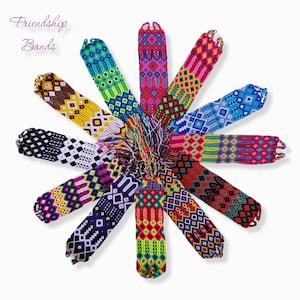 May include: A collection of colourful friendship bracelets with various geometric patterns. The bracelets are arranged in a circle, with the ends of each bracelet tied together in the centre.