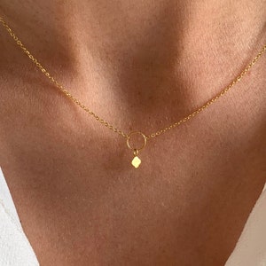 Ultra thin stainless steel necklace with clover pendant / Women's necklace with minimalist golden chain for luck