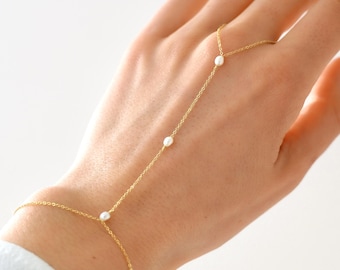 Handsieraad van roestvrij staal met zoetwaterparels / Handketting van parelmoer
