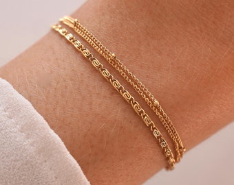 Women's stainless steel triple row fine chain bracelet