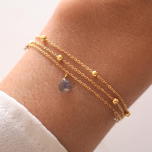 Women's stainless steel triple-strand bracelet with a fine chain and natural labradorite stone