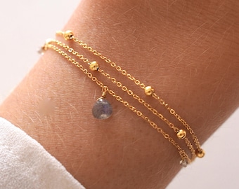 Women's stainless steel triple-strand bracelet with a fine chain and natural labradorite stone