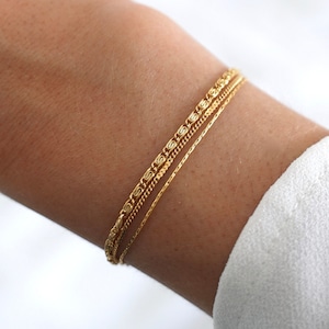 Women's stainless steel triple row fine chain bracelet