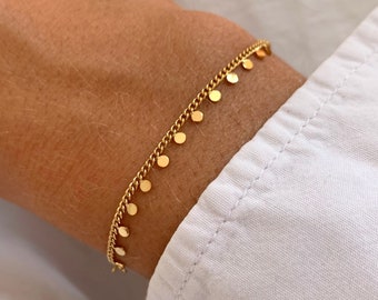 Pulsera de acero inoxidable para mujer con cadena fina y redonda.