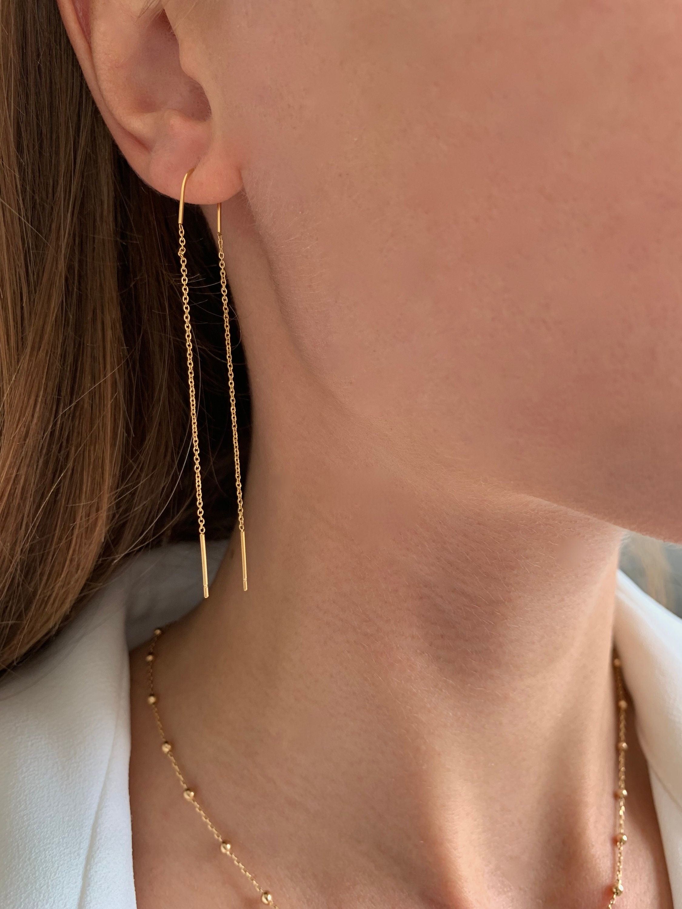 Earrings that hang on both best sale sides