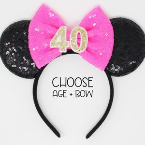 May include: Black sequin Minnie Mouse ears headband with a pink bow and gold glitter number 40. Choose age and bow.