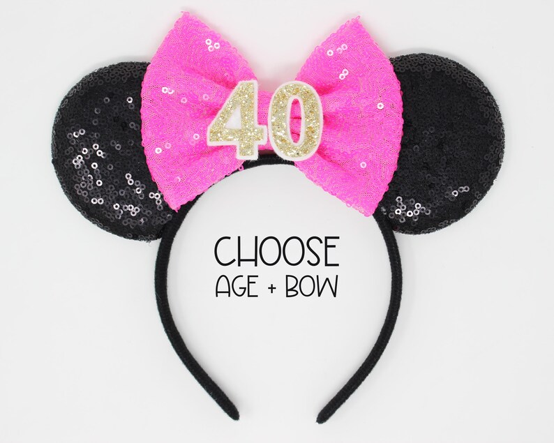 May include: Black sequin Minnie Mouse ears headband with a pink bow and gold glitter number 40. Choose age and bow.