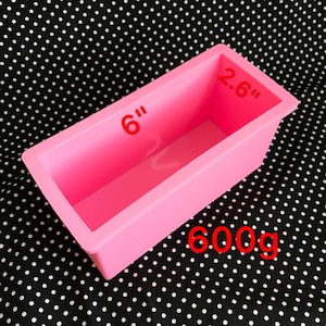 May include: Pink silicone soap mould with measurements 6" x 2.6" and a weight of 600g.