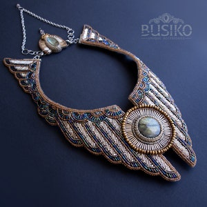 Egyptian beaded embroidered collar necklace with gold and blue wings. Statement Cleopatra jewelry. Ancient Egypt bib necklace