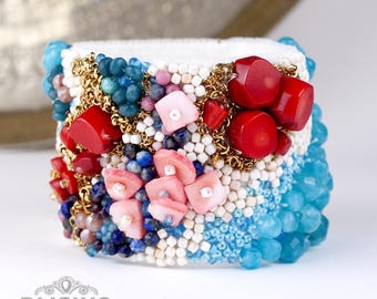 Bright multi-colored Beaded cuff bracelet. Blue gold ivory bracelet with aquamarine coral lapis lazuli and chains. Statement beaded jewelry.