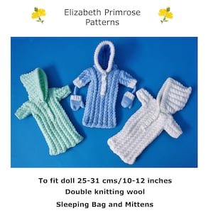 May include: Three knitted sleeping bags for dolls, one blue, one white, and one green. The bags are designed to fit dolls 10-12 inches tall. The bags are made with double knitting wool and include mittens.