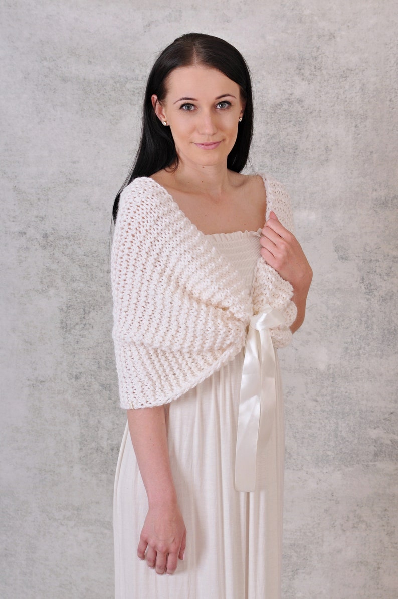 white bridal alpaca cover up with satin 