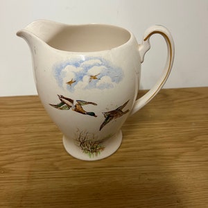 Grote vintage Alfred Meakin kruik vliegende ganzen motief (#b)