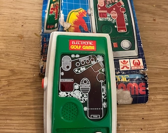 Juego portátil de golf electrónico Bandai Championship de los años 80