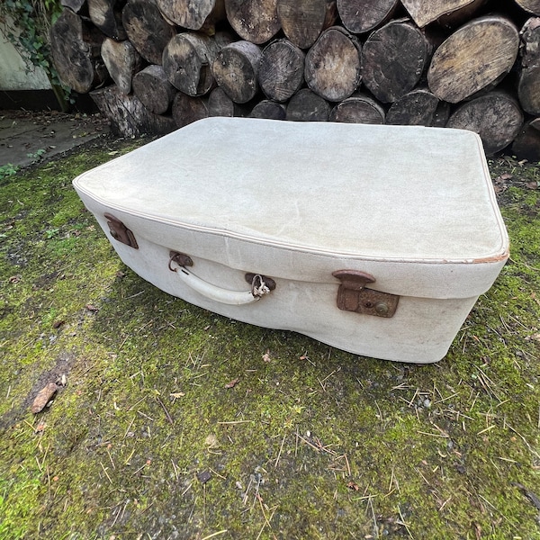 Vintage White Suitcase In Distressed Condition