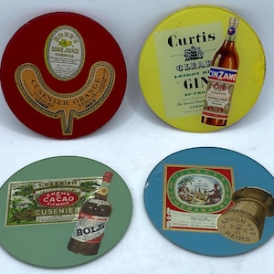Rare glass coasters. Pictures of bottles and labels of famous liqueurs.