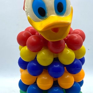 Walt Disney Productions, stacking colored rings,