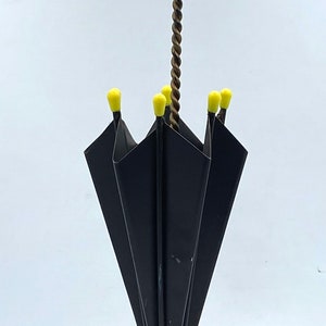 Rare miniature design steel umbrella stand. Beautiful design, partly due to the yellow accents. Good state.