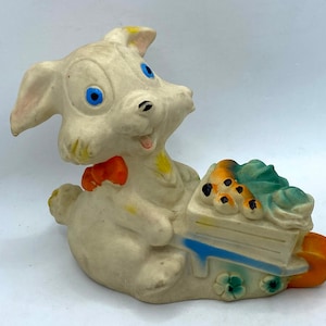 Rubber rabbit pushing wheelbarrow with vegetables. 1950&#39;s/60&#39;s, Made in the Republic of Ireland