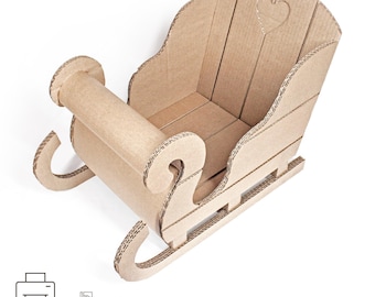 May include: A cardboard sleigh with a heart-shaped cutout on the back. The sleigh is brown and has a wooden seat. The sleigh is a DIY project with templates and a tutorial available for download.