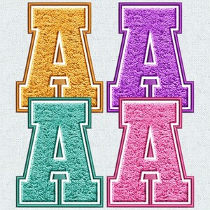 May include: Four felt letter patches in different colours: gold, purple, teal and pink. Each patch is a capital letter A with a white outline.