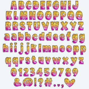 May include: A set of pink and gold glitter alphabet letters and numbers with a heart symbol. The letters and numbers are outlined in black and have a sparkly, glittery finish.