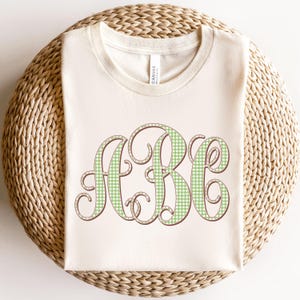 May include: A rustic wooden sign with the text "Welcome to our home" in a handwritten style. The sign has a distressed finish and a simple, inviting design, ideal for a front porch or entryway.