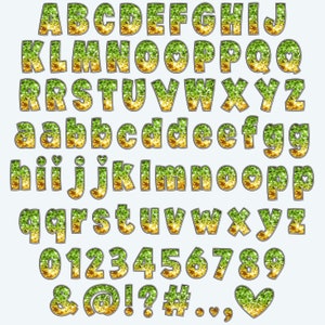 May include: A gold and green glitter alphabet with uppercase and lowercase letters, numbers 0-9, and symbols including ampersand, at sign, exclamation point, question mark, number sign, period, comma, and a heart.