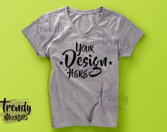 Download Free Grey Woman Tshirt Mockup Green Background Mockup Tshirt Design PSD Mockup Template