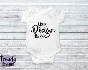 Download Free Bodysuit Mockup Baby Mockup Wood Background White Bodysuit Bodysuit Styled Photo Baby Mock Up Custom Design Background Jumpsuit Logo Mockup Vectors Photos And Psd Files Free Download PSD Mockup Template