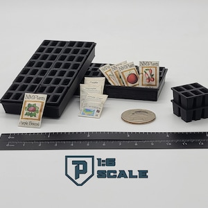 May include: A miniature gardening set includes black plastic seed trays, seed packets, and a ruler. The seed packets feature illustrations of vegetables. A quarter coin is also included. The text "1:6 SCALE" is visible.